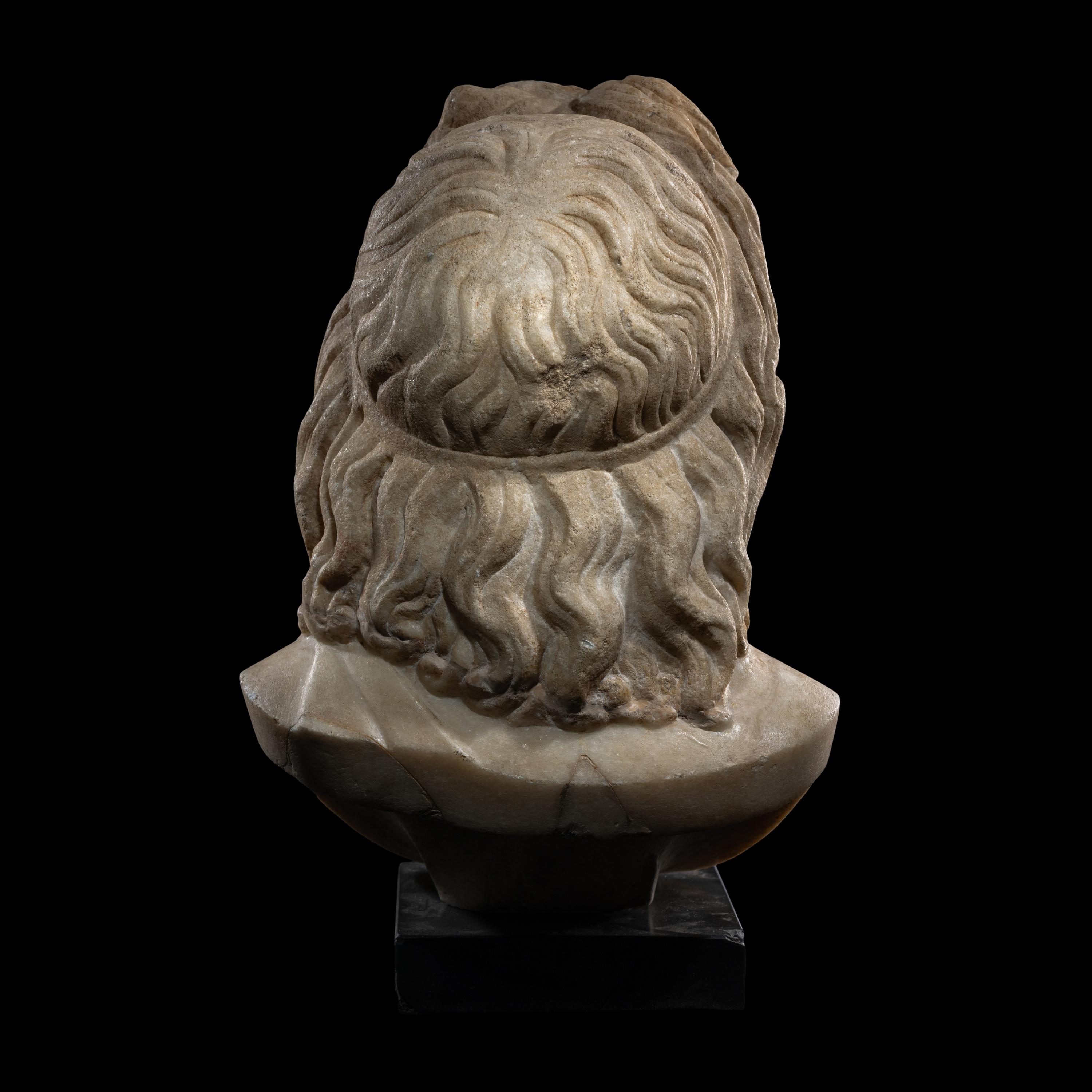 A Roman Marble Head of a God