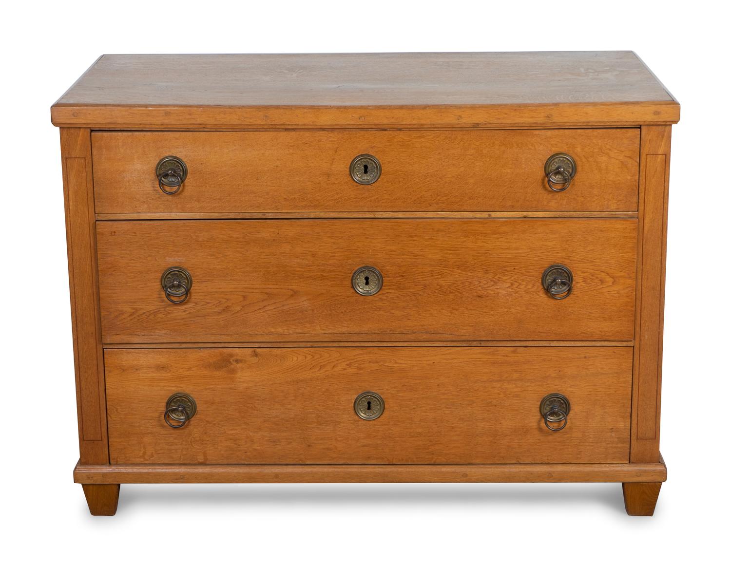 A Continental Neoclassical Style Oak Chest of Drawers — 20TH CENTURY