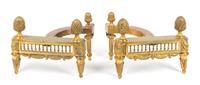 A Pair of Gilt Bronze Chenets Height 8 inches. — 20TH CENTURY