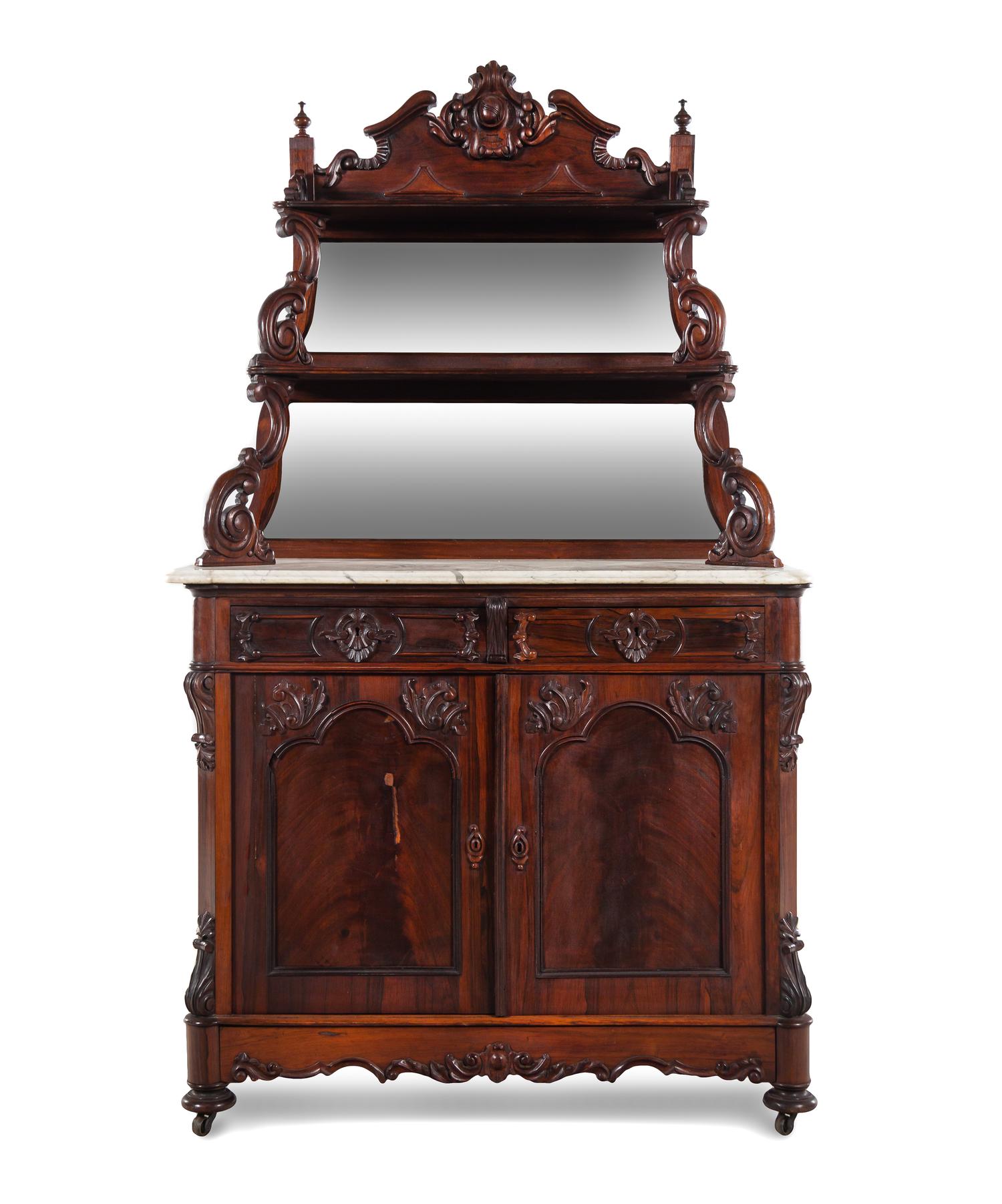 A Rococo Revival Carved Rosewood Marble-Top Serving Cabinet