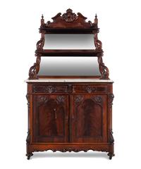 A Rococo Revival Carved Rosewood Marble-Top Serving Cabinet