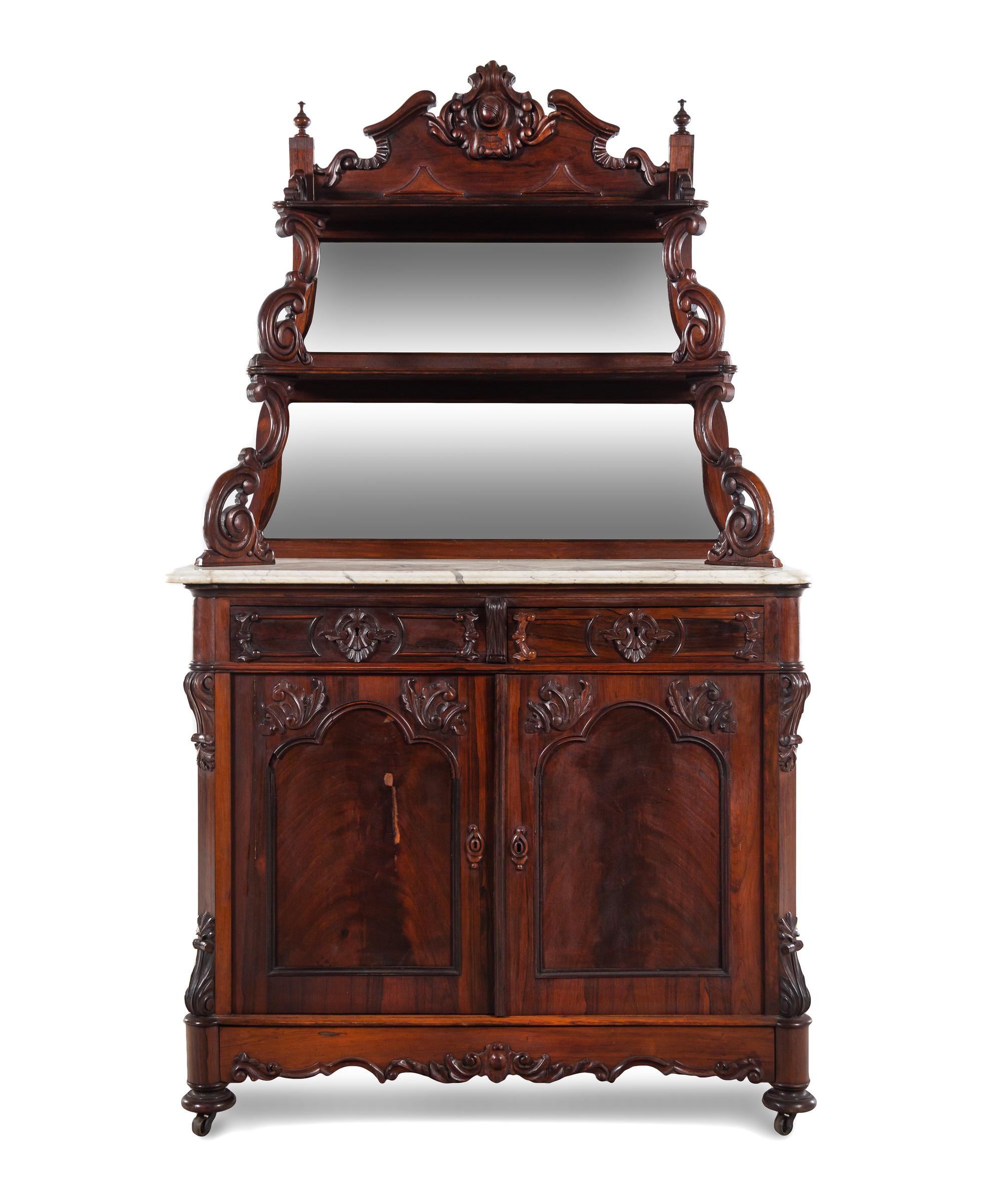 A Rococo Revival Carved Rosewood Marble-Top Serving Cabinet