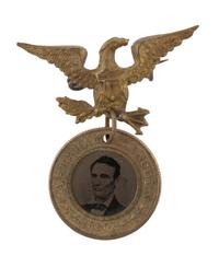 [LINCOLN, Abraham (1809-1865)]. Abraham Lincoln and Hannibal Hamlin back-to-back campaign ferrotype with eagle hanger. 1860.