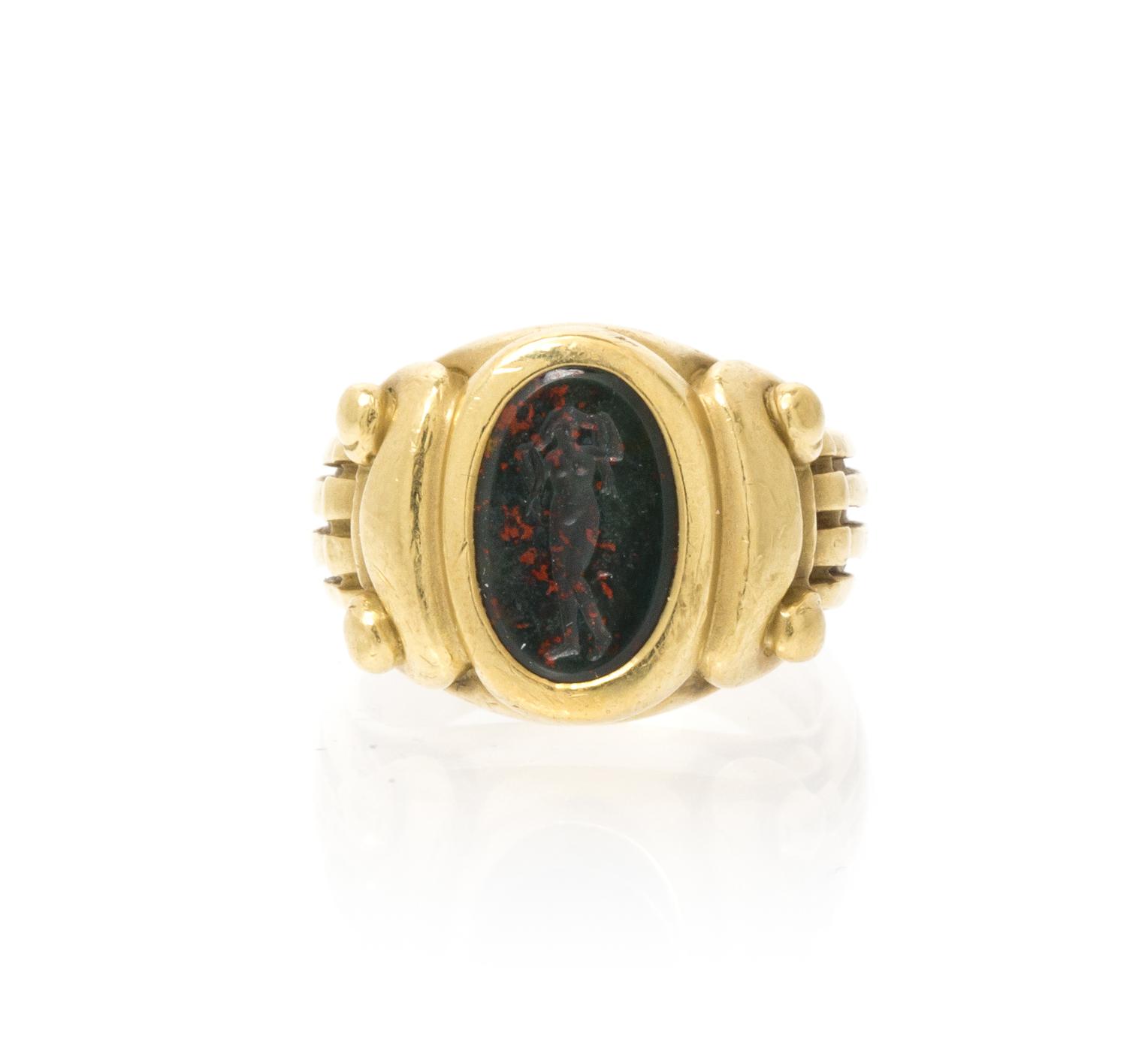 An 18 Karat Yellow Gold and Carved Bloodstone Ring, Kieselstein-Cord, 9.90 dwts.