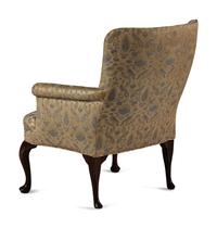 A Queen Anne Style Carved Walnut Armchair