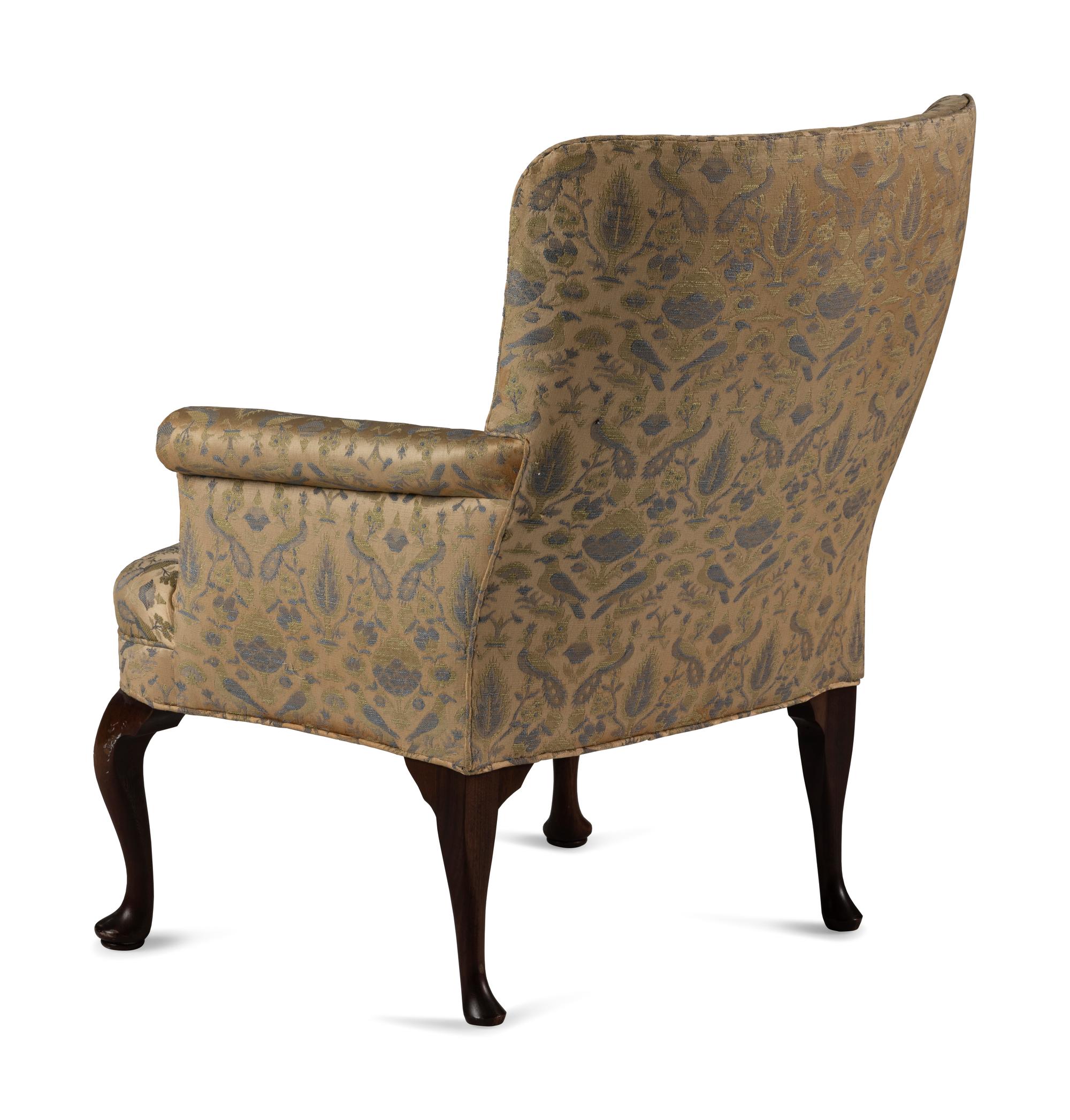 A Queen Anne Style Carved Walnut Armchair