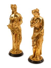 Theodore Doriot (French, 19th Century) Allegorical Figures (a pair) gilt bronze signed T. Doriot Height overall 16 inches.