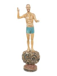 An Italian Carved and Polychromed Giltwood Santos Figure