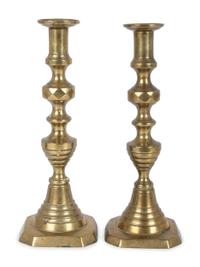 Three Pairs of English Brass Candlesticks