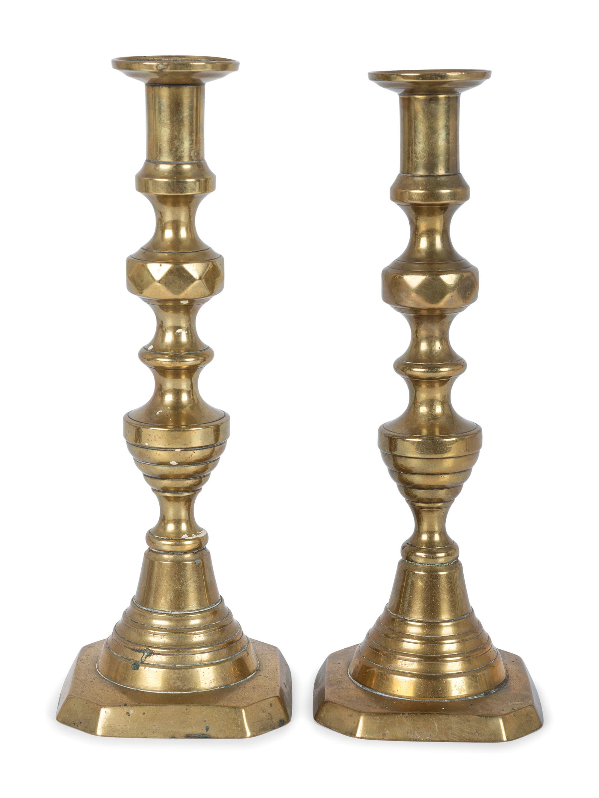 Three Pairs of English Brass Candlesticks