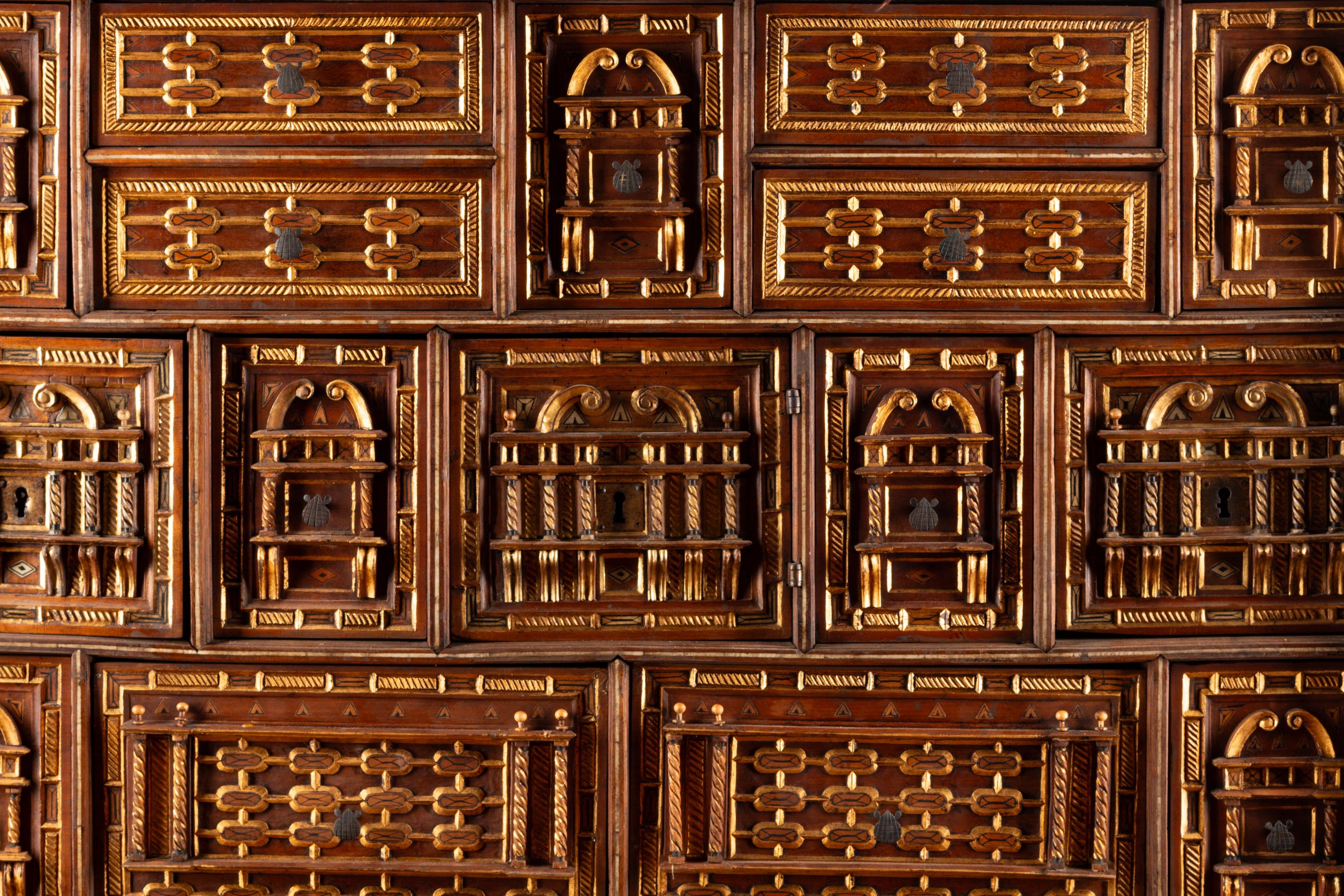 A Spanish Baroque Walnut Vargueño on Stand