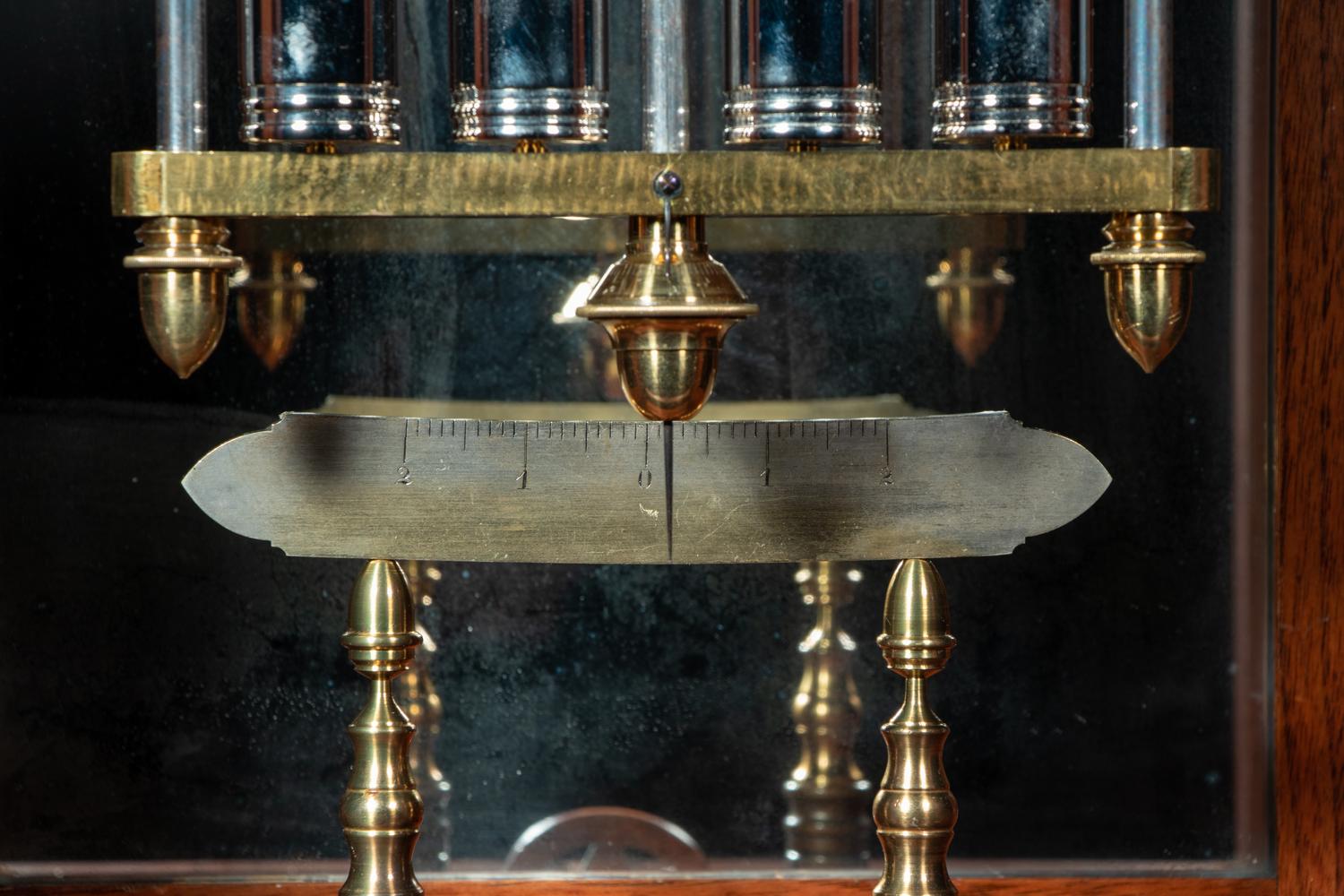 A Gothic Revival Carved Mahogany Tall Case No. 24 Astronomical Regulator