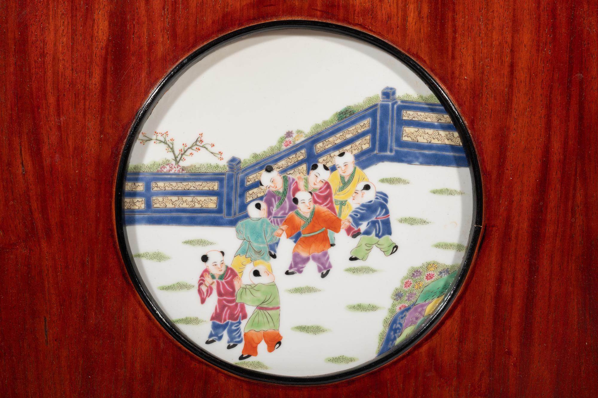 A Set of Four Chinese Famille Rose Porcelain Inset Hardwood Hanging Screens