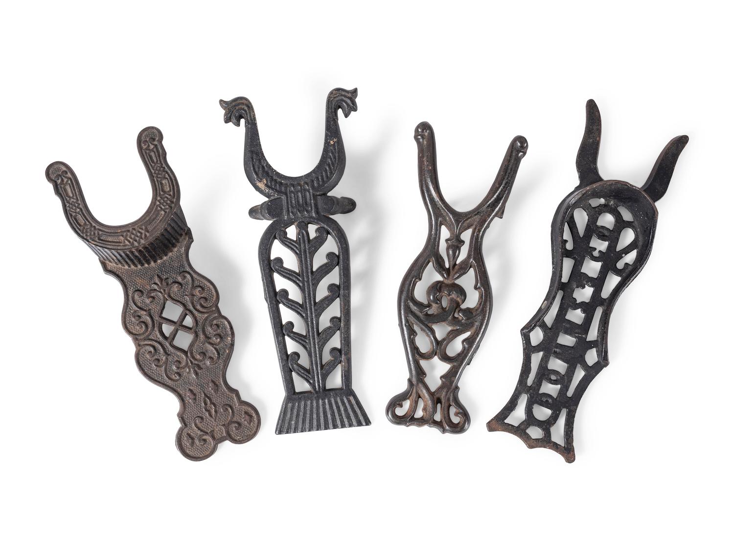 Six Cast Iron Boot Jackets