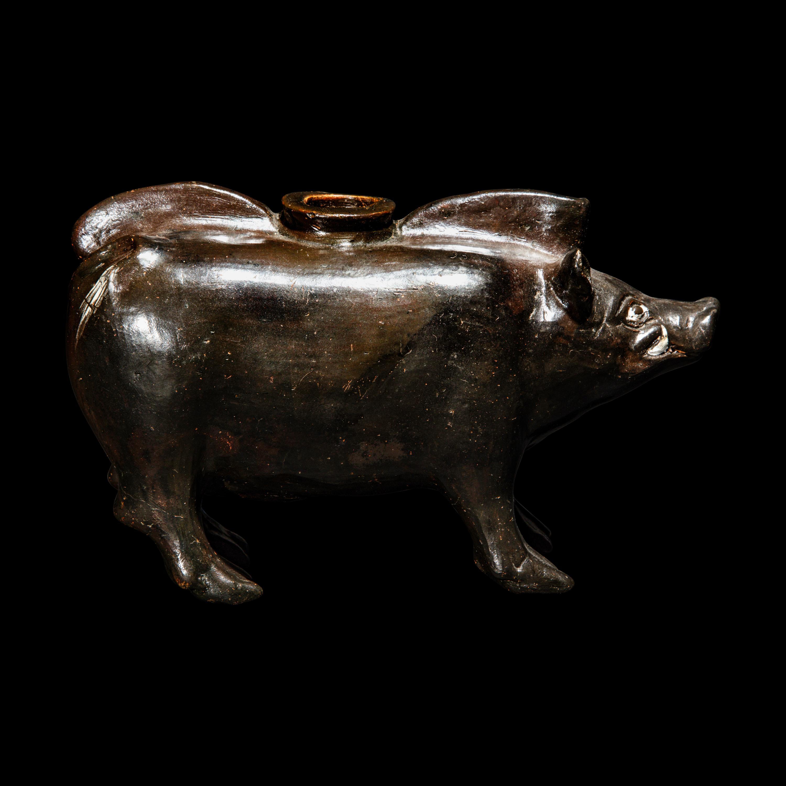 A South Italian Black-Glazed Askos in the form of a Boar