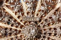 Three Chanel Jewelry Pieces: Earrings and Cuff by Robert Goossens and Pendant Necklace, 1954-74