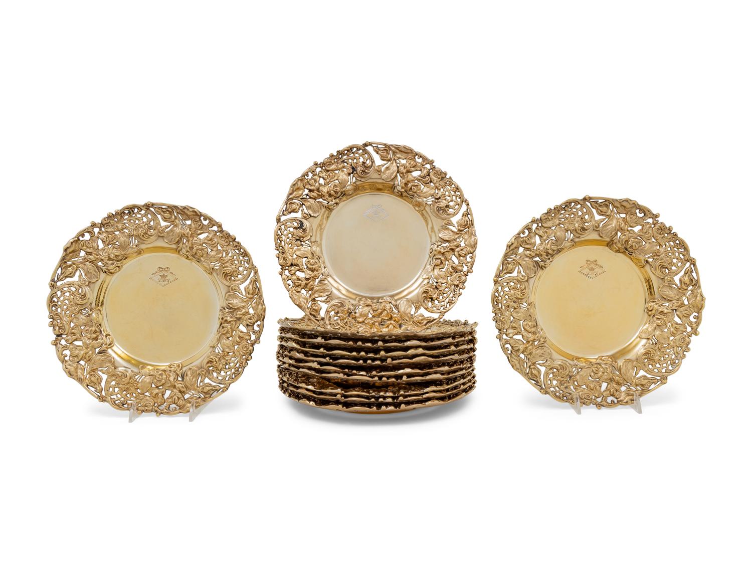 A Set of Eleven American Silver-Gilt Reticulated Plates