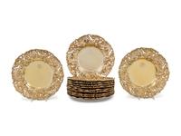 A Set of Eleven American Silver-Gilt Reticulated Plates