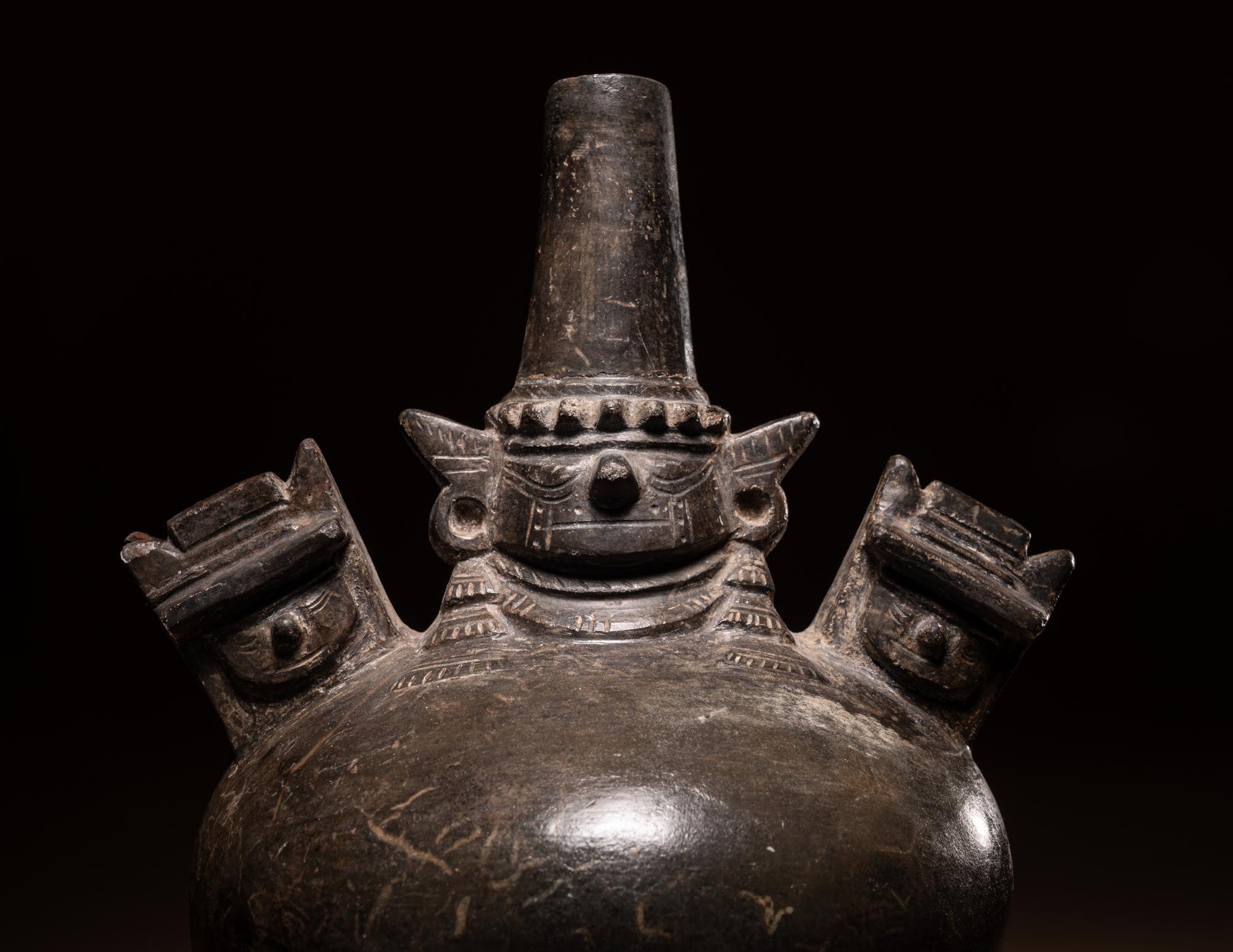 A Sican Blackware Stirrup Vessel