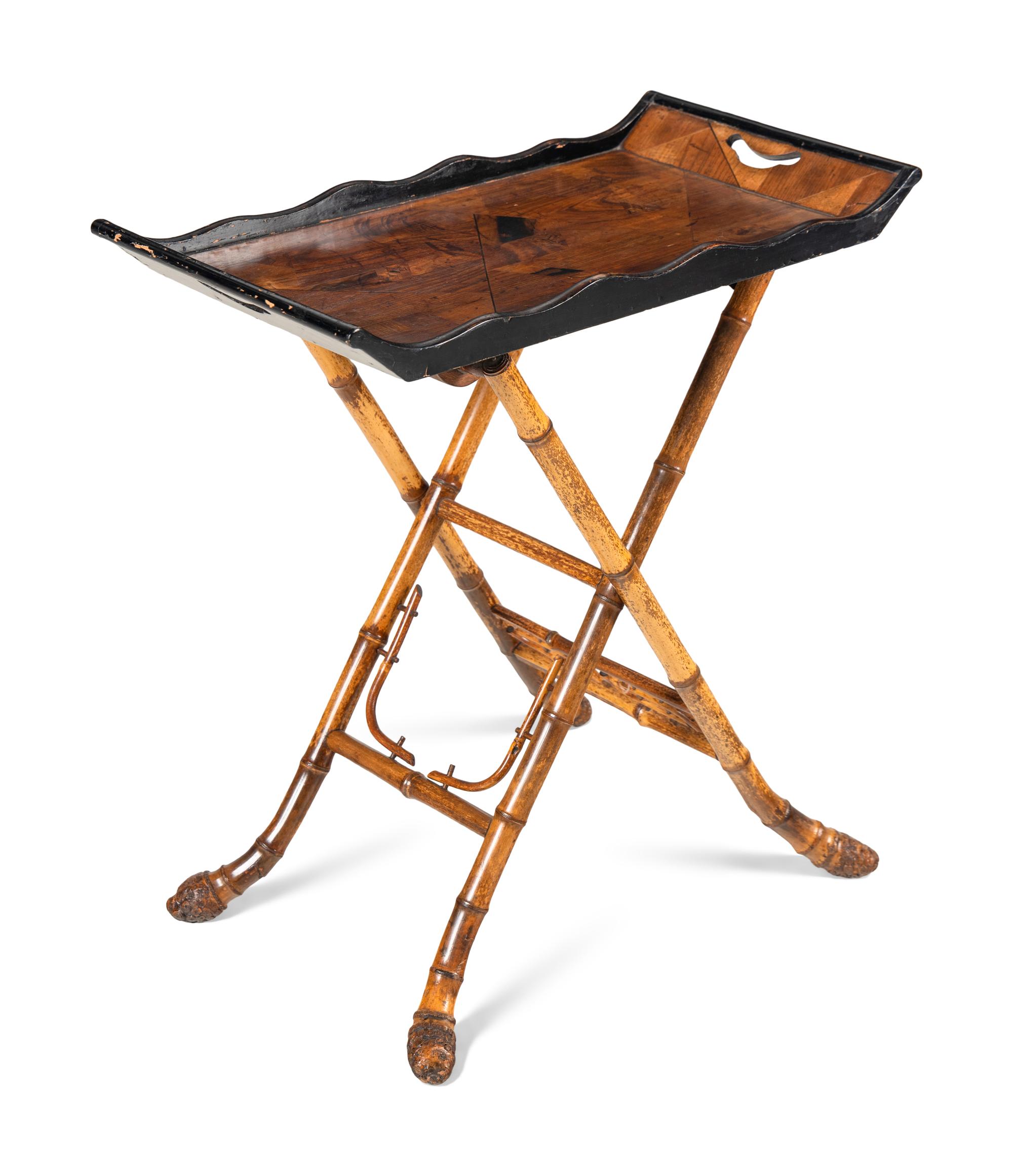 A Victorian Part Ebonized Tray Table on a Faux Bamboo Stand