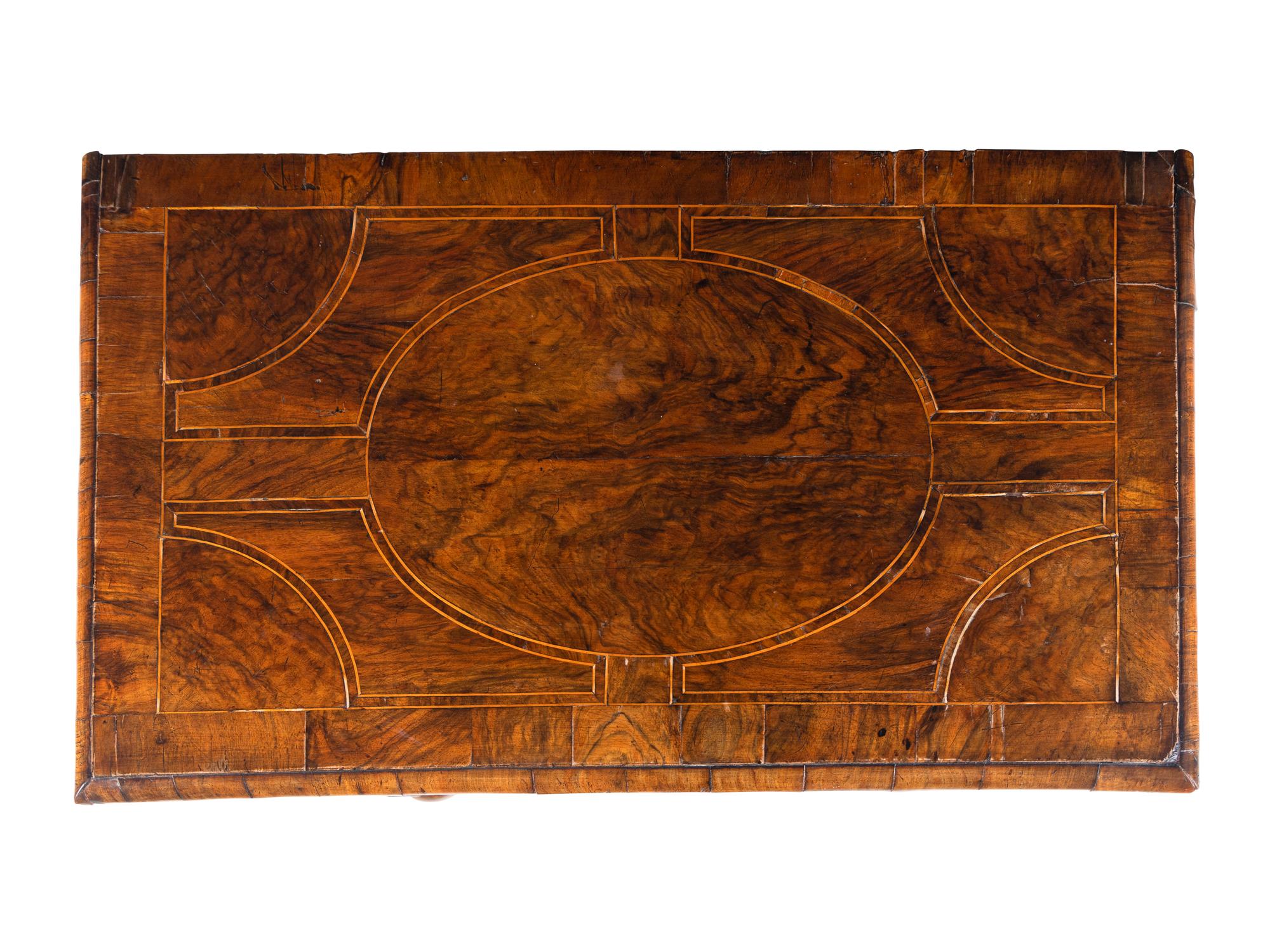 A George II Satinwood-Inlaid Walnut Chest of Drawers
