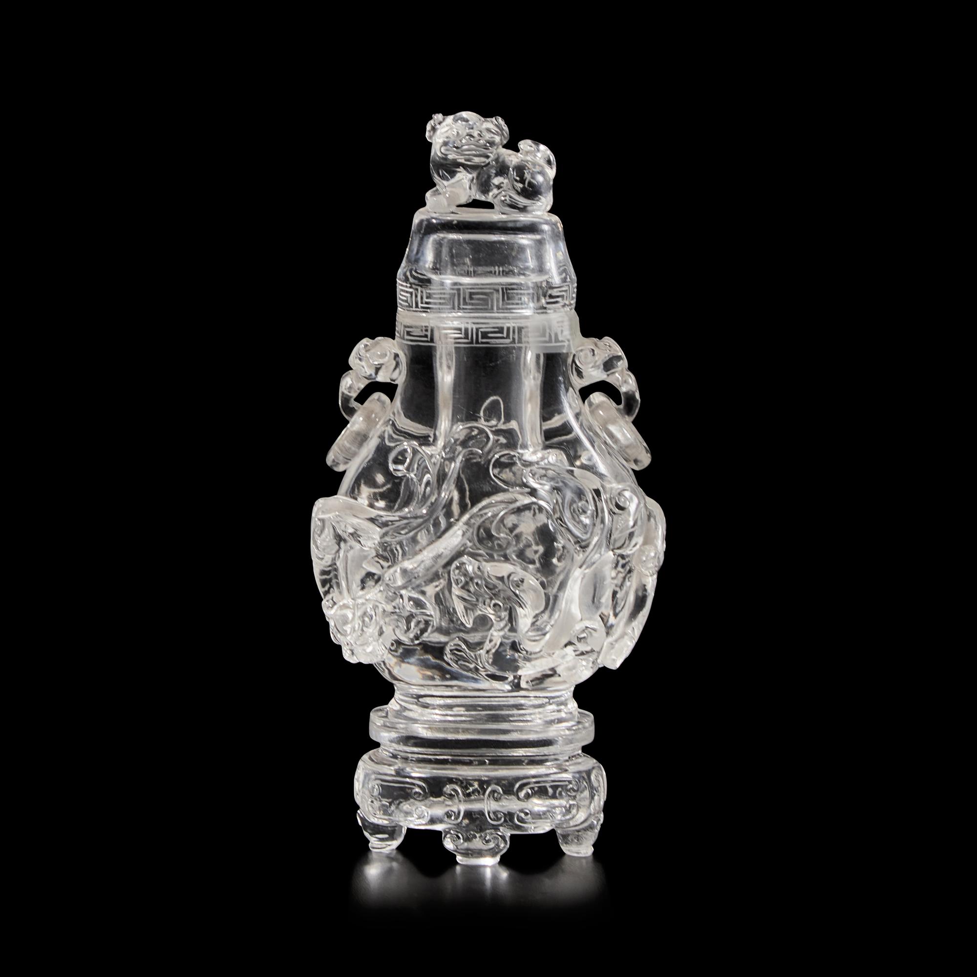 A Chinese Rock Crystal Vase, Cover, and Stand, 19th Century 清晚期 水晶雕螭龍雙耳瓶