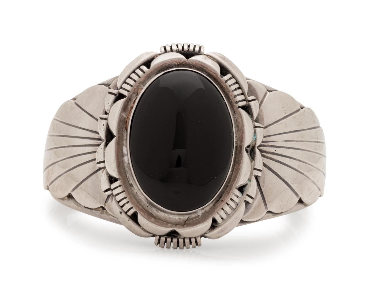 A Silver and Onyx Cuff,