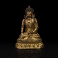 A Sino-Tibetan gilt bronze figure of Akshobhya 中原或藏传佛教阿閦佛铜造像 18th century ????