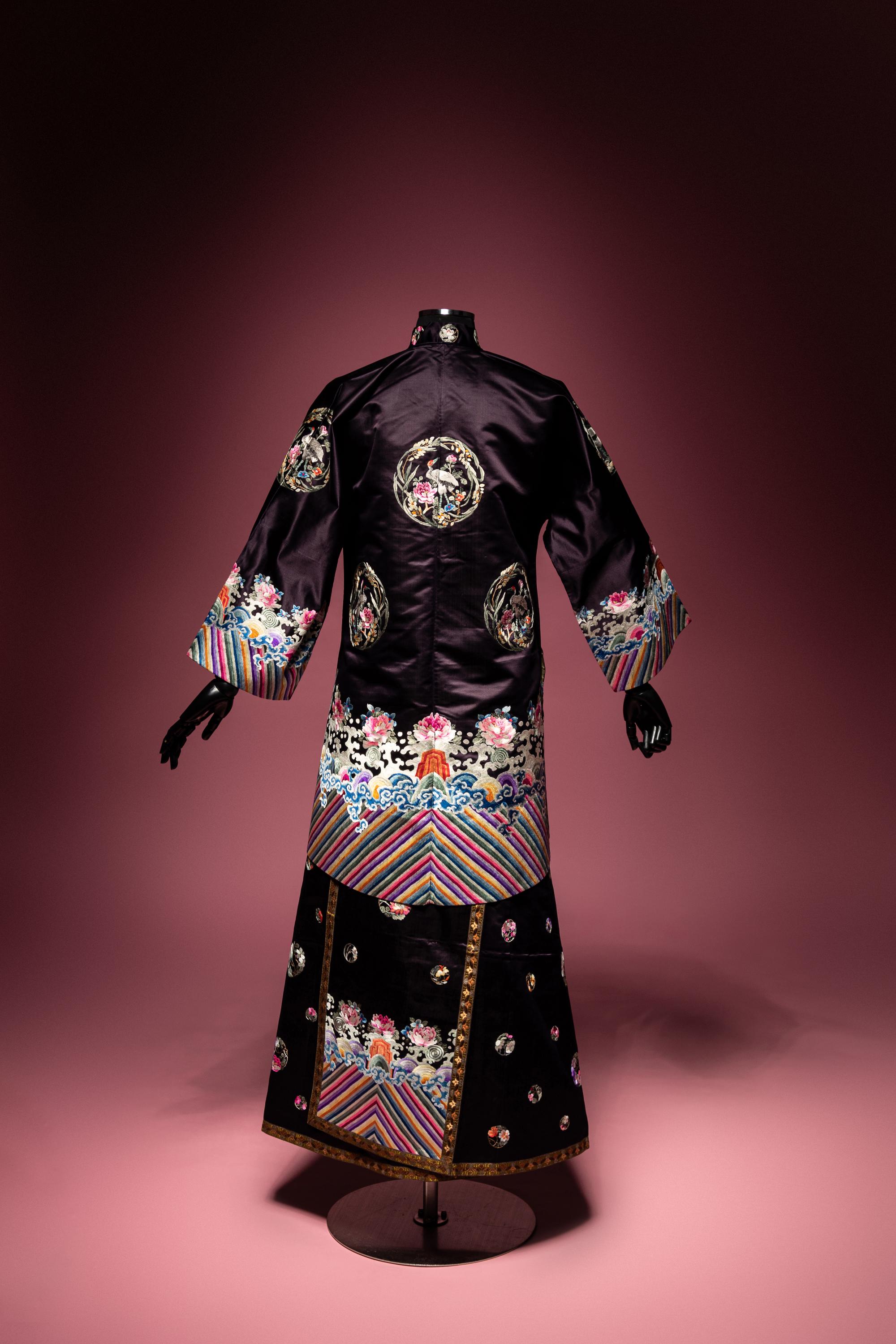 A Set of Aubergine Satin Ground Embroidered Silk Lady's Robe and Skirt
