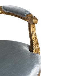 A Pair of Louis XVI Style Giltwood Fauteuils