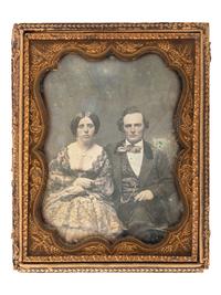 [EARLY PHOTOGRAPHY]. A group of 19 daguerreotypes, ambrotypes, tintypes, and CDVs featuring women, a family, and couples, highlighted by half plate daguerreotype of a young couple.