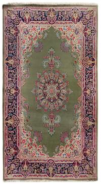 A Kirman Wool Rug 10 feet 5 inches x 6 feet 6 inches. — 20TH CENTURY