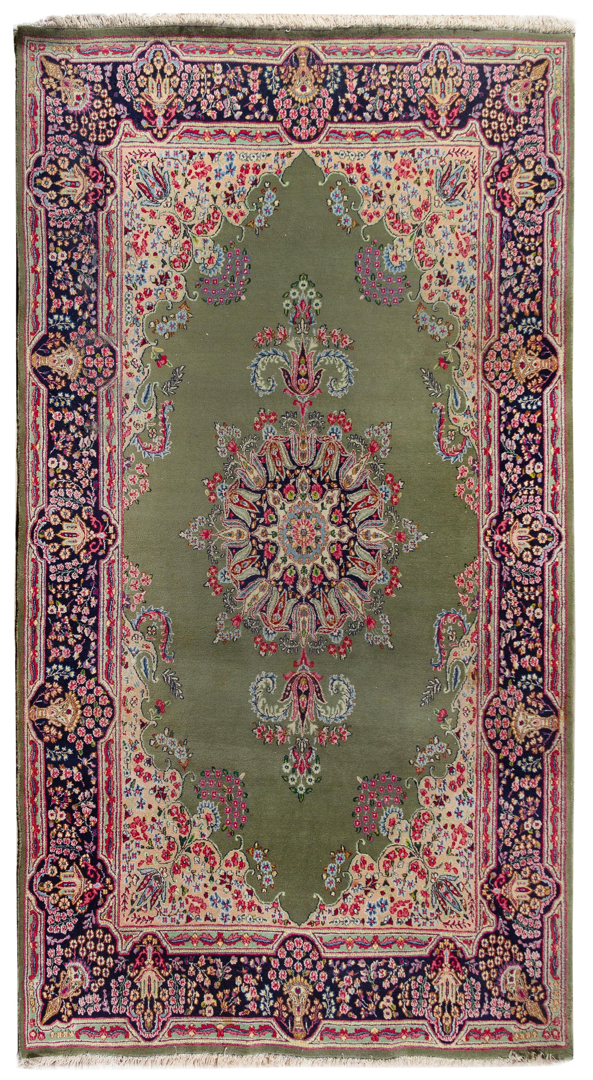 A Kirman Wool Rug 10 feet 5 inches x 6 feet 6 inches. — 20TH CENTURY