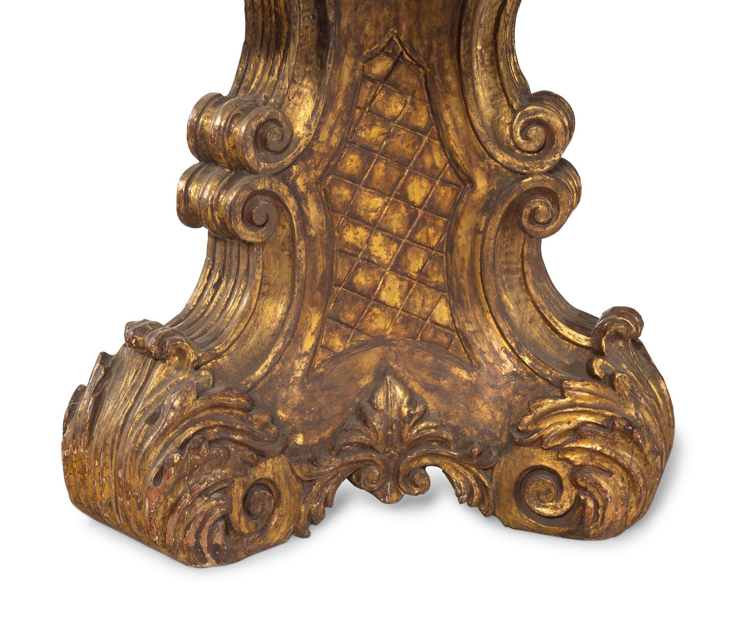 An Italian Baroque Style Carved Giltwood Marble-Top Pedestal Table