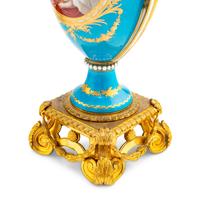 A Pair of Sèvres Style Porcelain and Gilt Bronze Mounted Vases