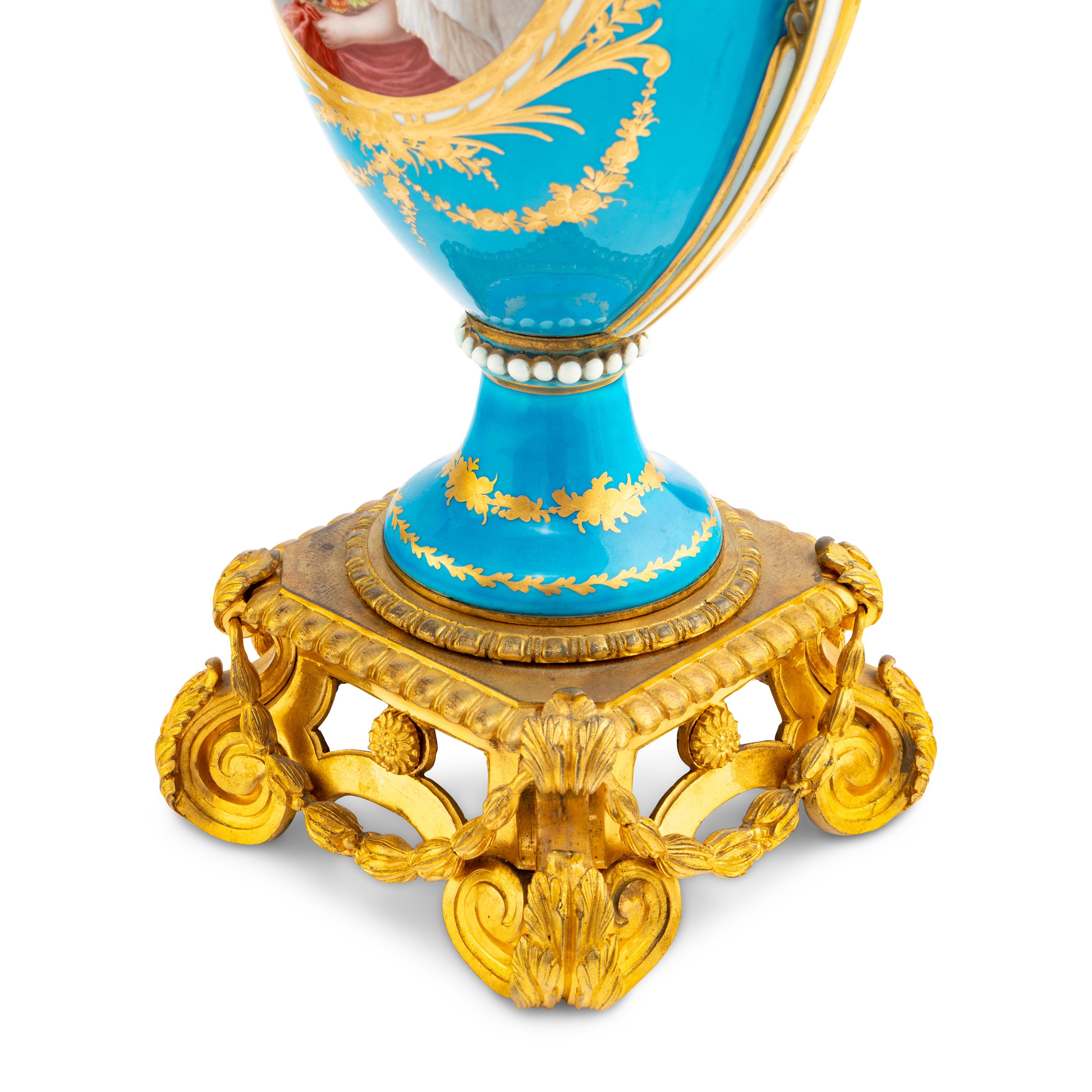 A Pair of Sèvres Style Porcelain and Gilt Bronze Mounted Vases