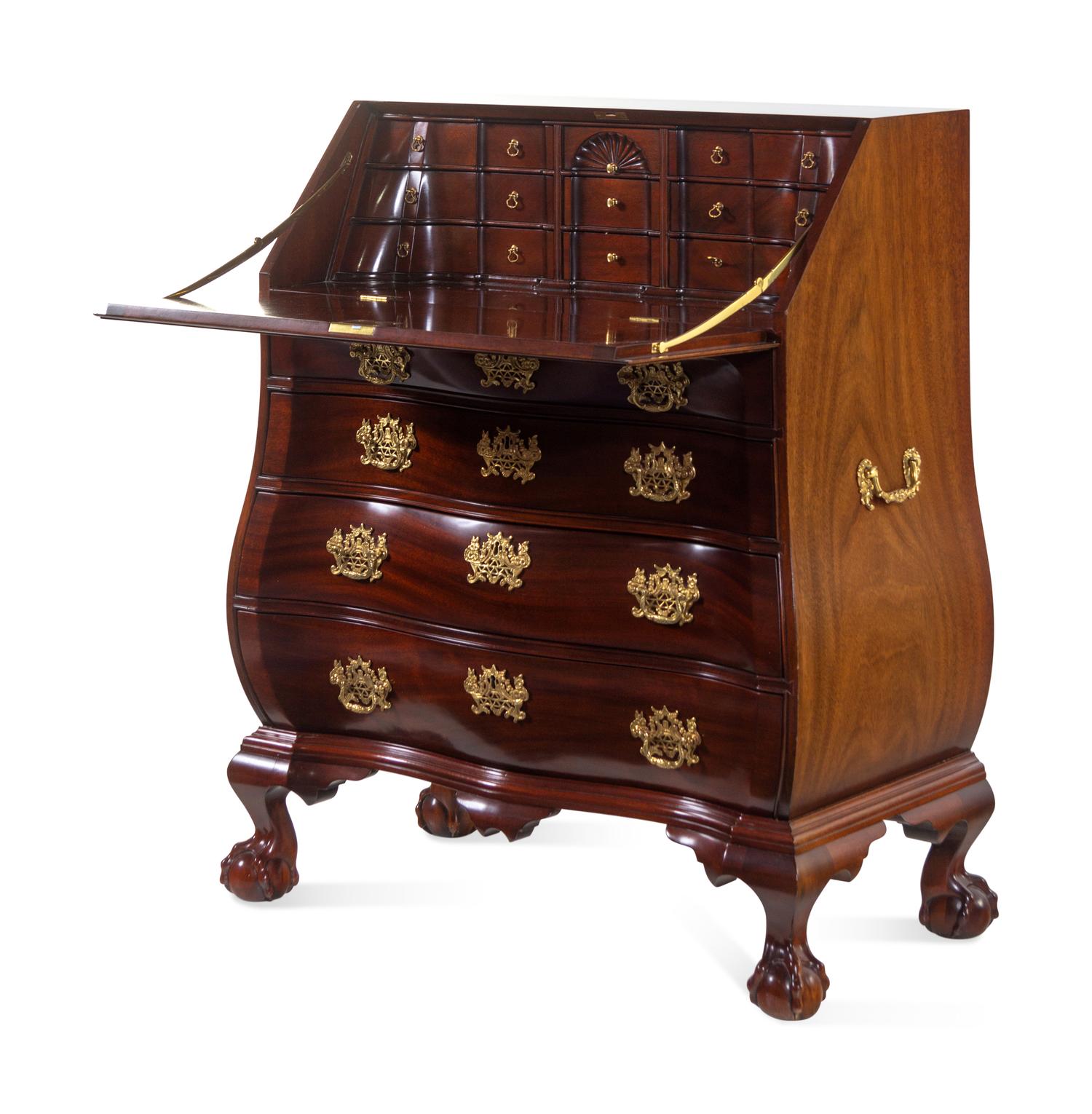 A Chippendale Style Carved Mahogany Bombe-Form Slant-Front Desk