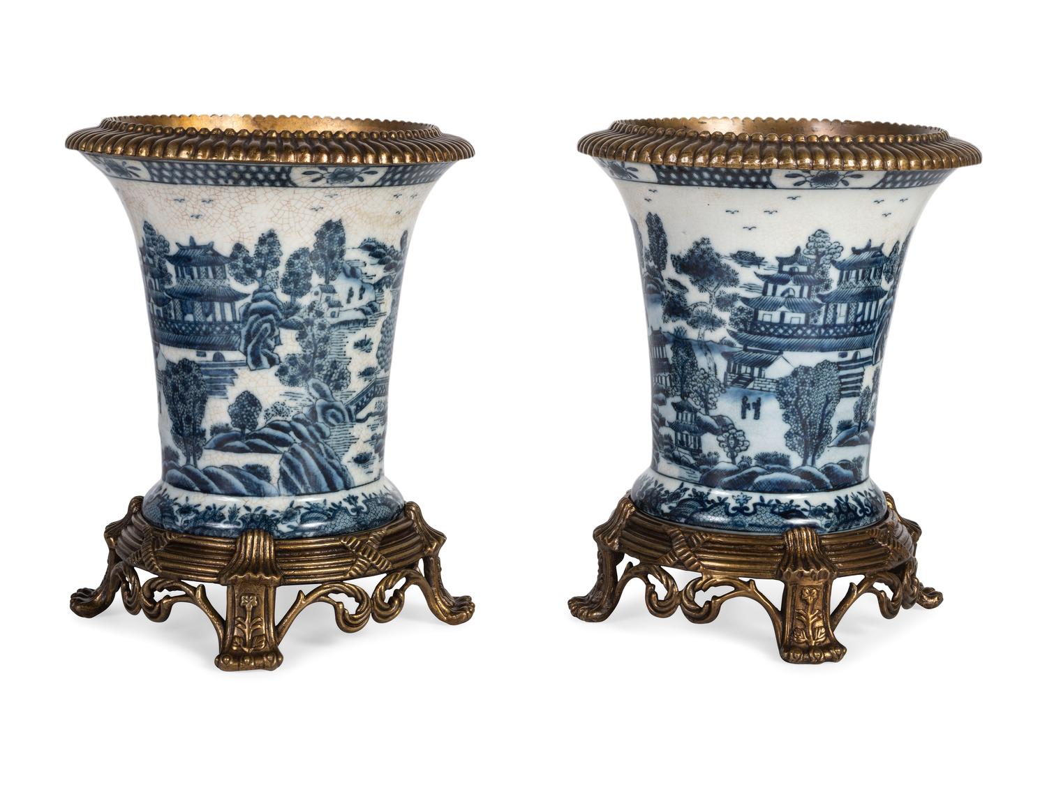 A Pair of United Wilson Gilt Metal Mounted Canton Style Porcelain Urns