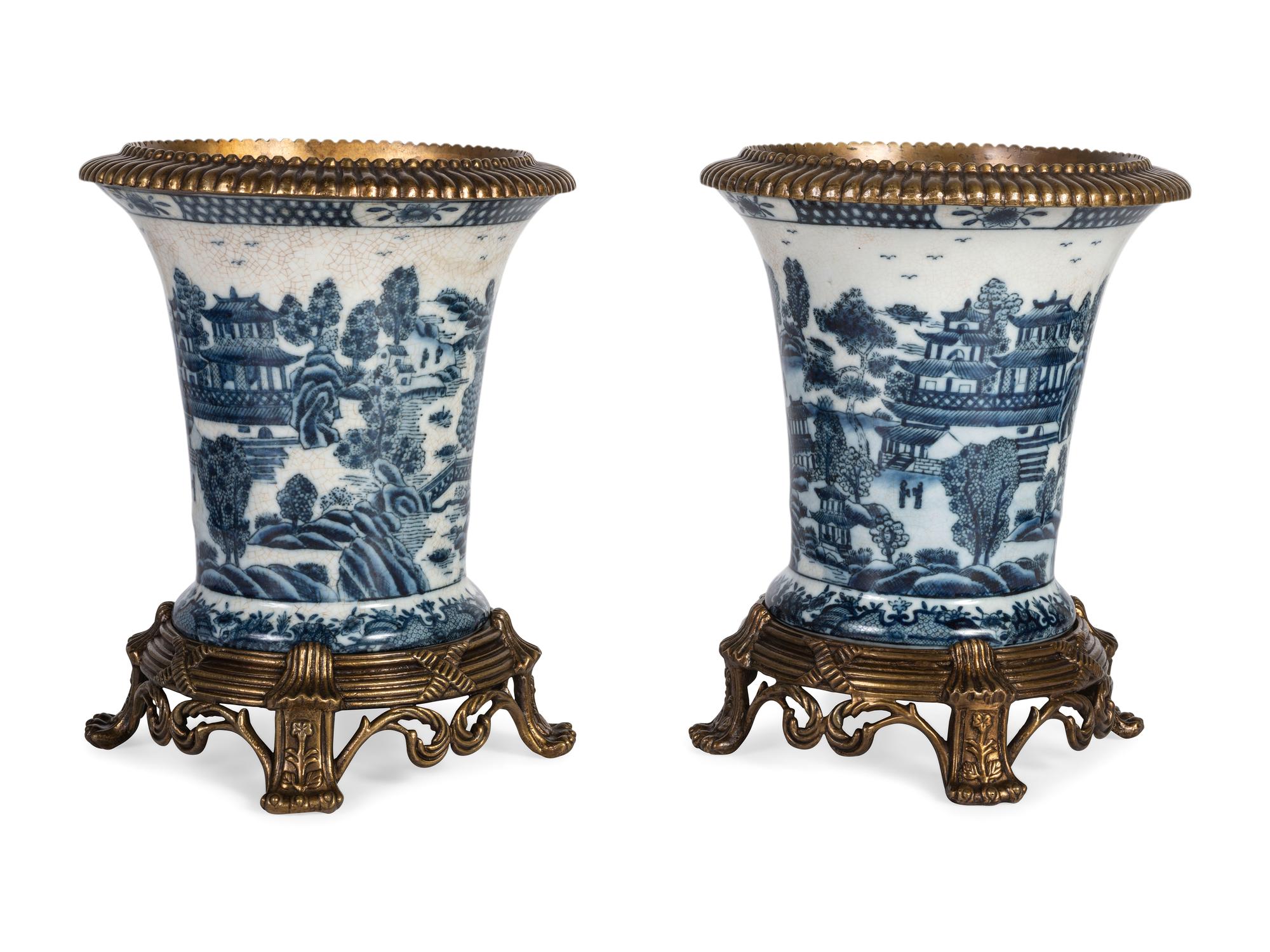 A Pair of United Wilson Gilt Metal Mounted Canton Style Porcelain Urns