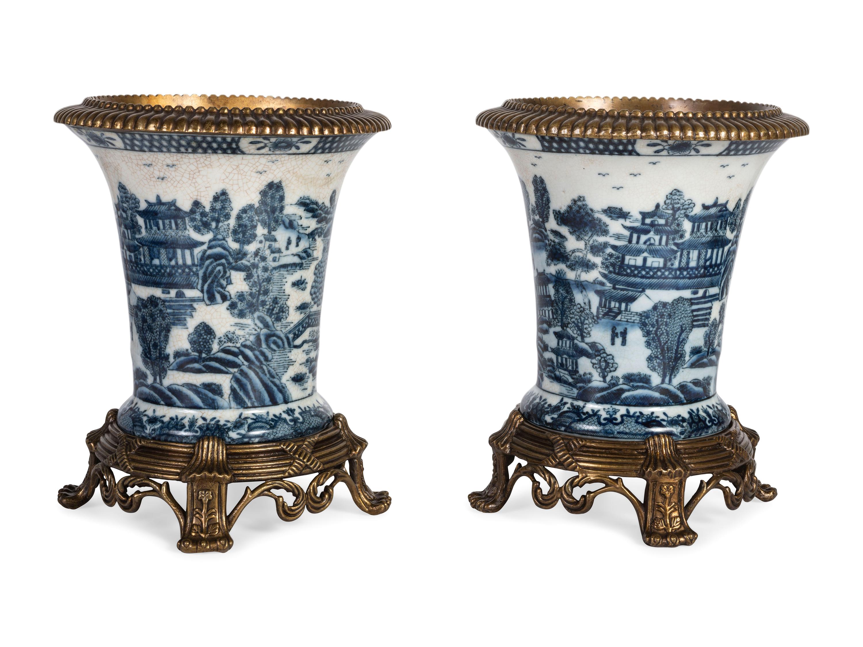A Pair of United Wilson Gilt Metal Mounted Canton Style Porcelain Urns