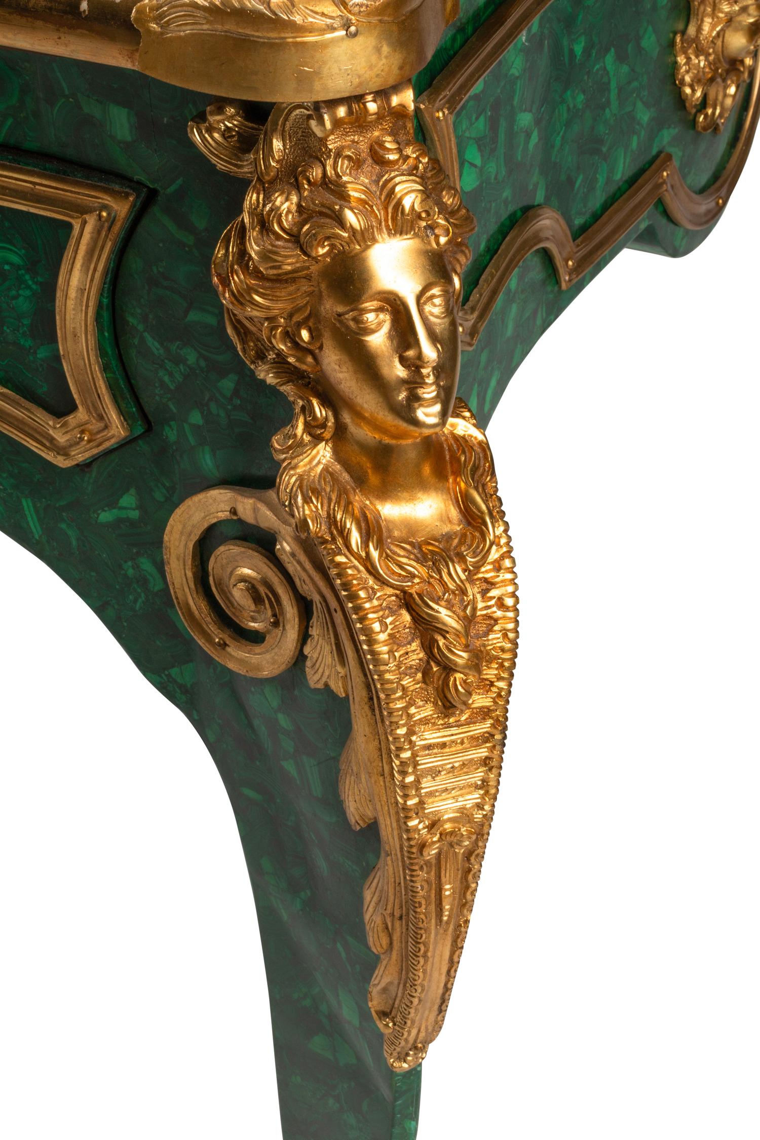 A Louis XV Style Gilt Bronze Mounted Malachite-Veneered Bureau Plat
