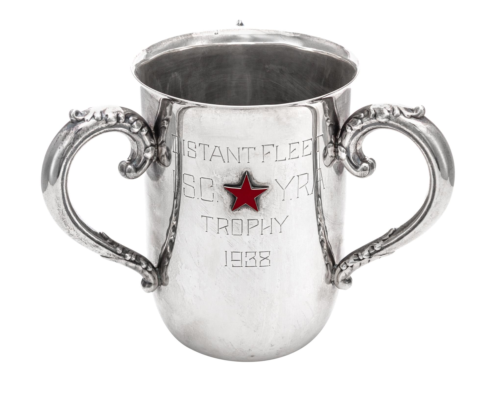 An American Silver Tyg, Dominick & Haff, New York, NY, 1901, Retailed by J.E. Caldwell, Philadelphia, PA, having foliate capped twin ha