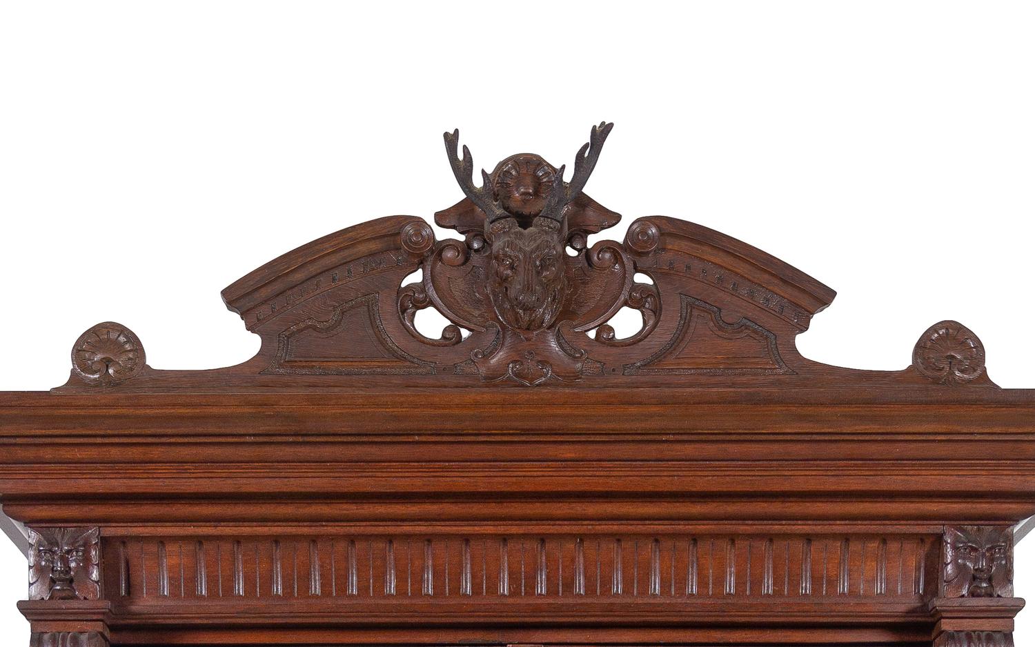 A Black Forest Style Carved Oak Cabinet