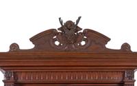 A Black Forest Style Carved Oak Cabinet