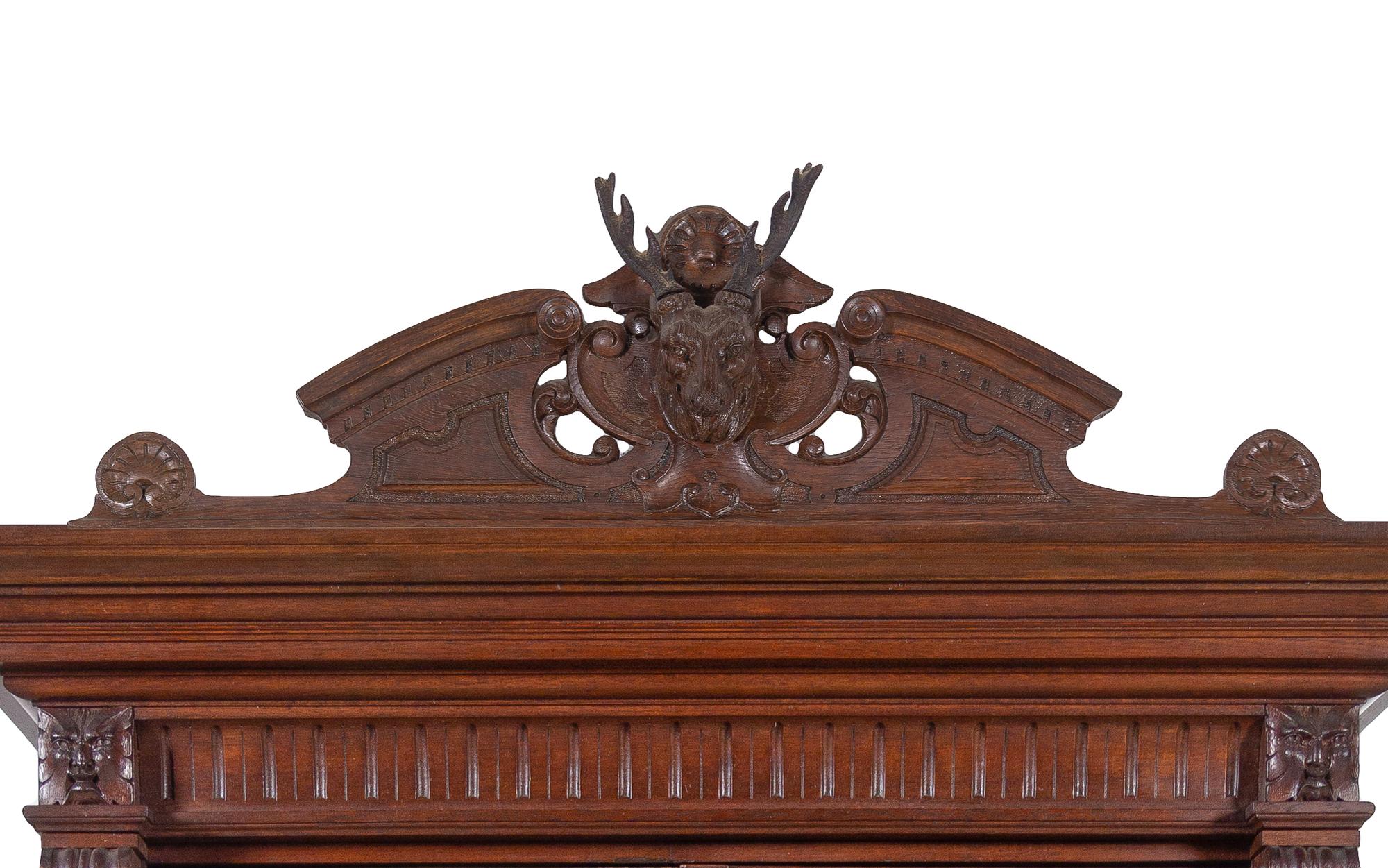 A Black Forest Style Carved Oak Cabinet