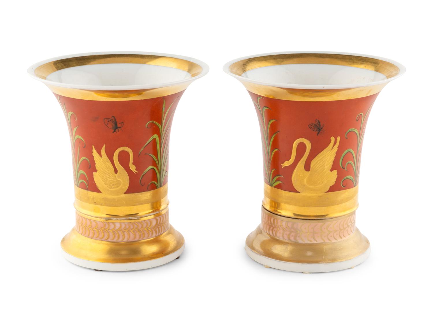 A Pair of Continental Parcel Gilt Porcelain Trumpet Vases