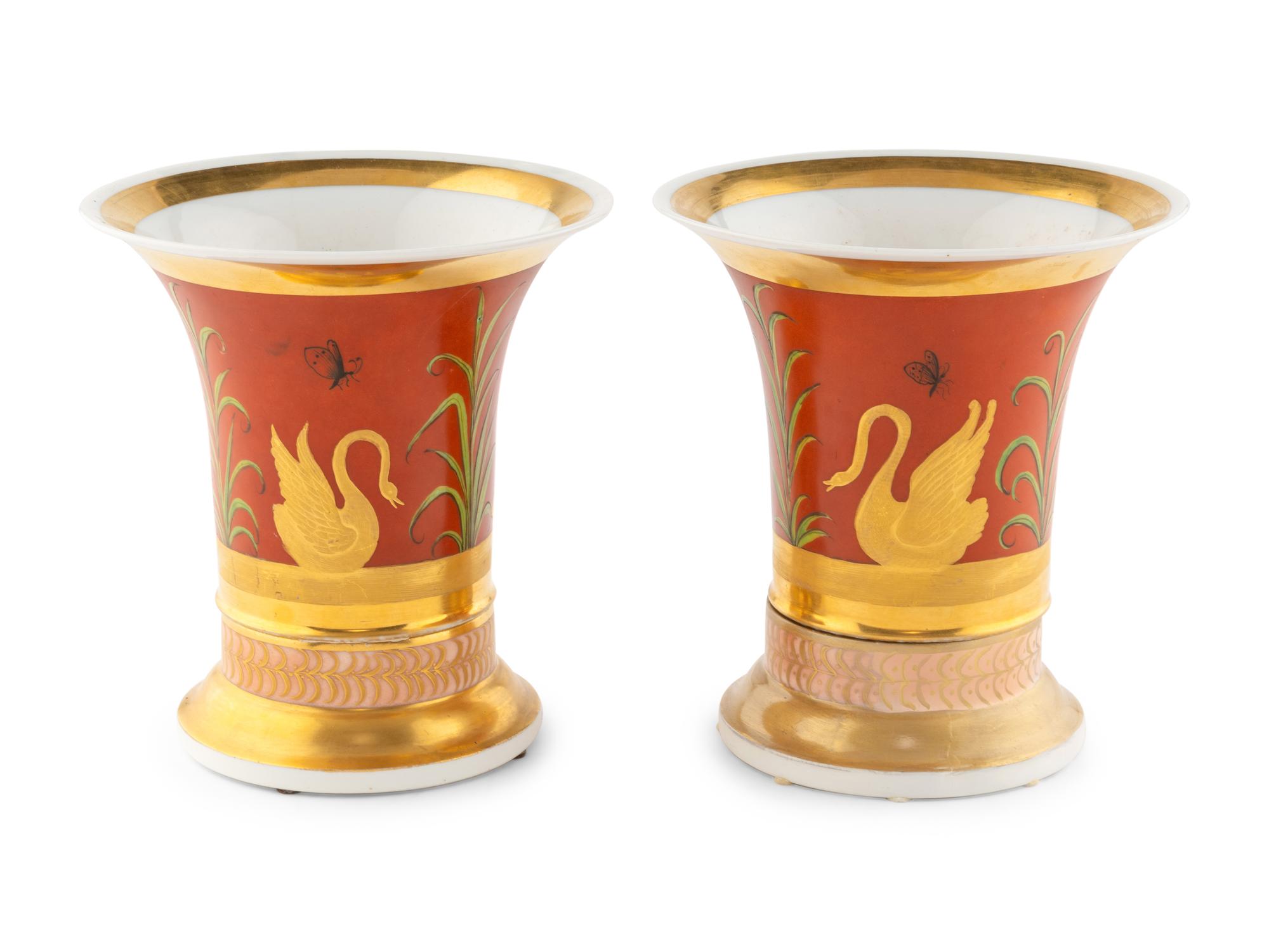A Pair of Continental Parcel Gilt Porcelain Trumpet Vases