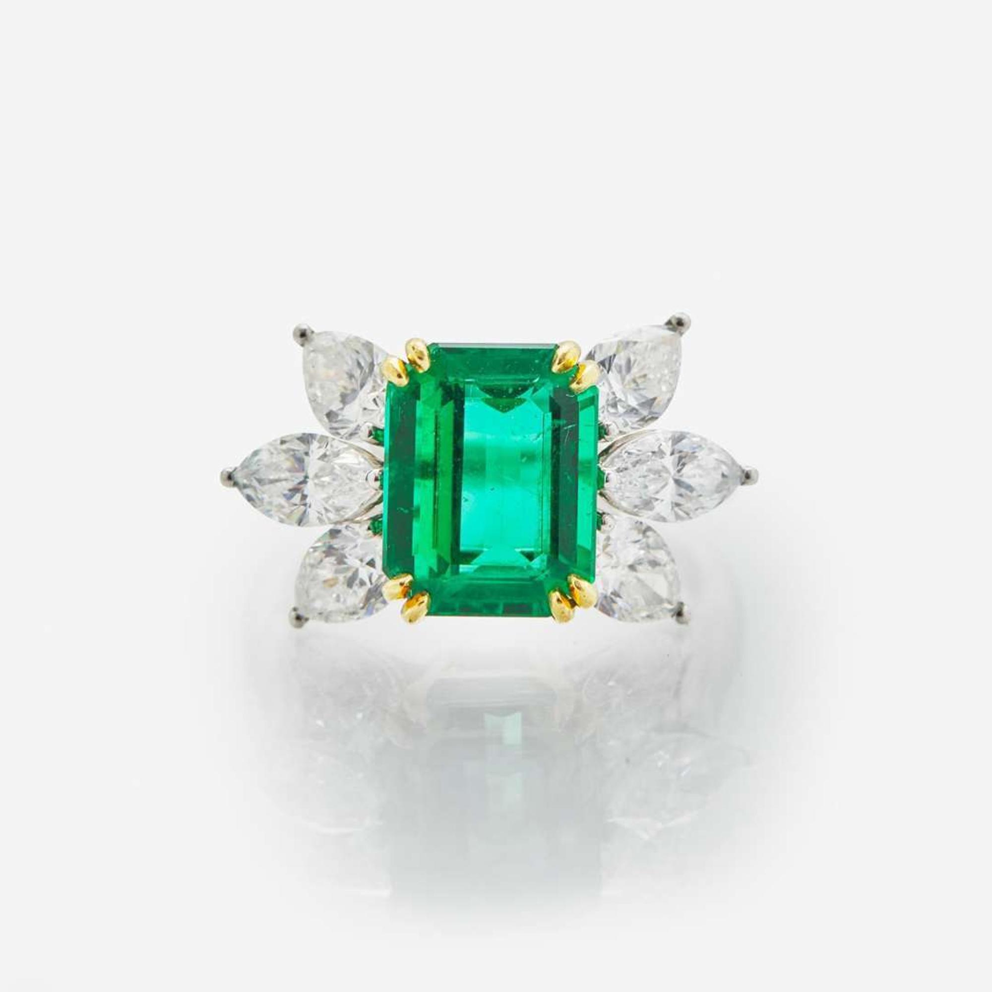 A Tiffany & Co. Platinum, Diamond, and Emerald Ring