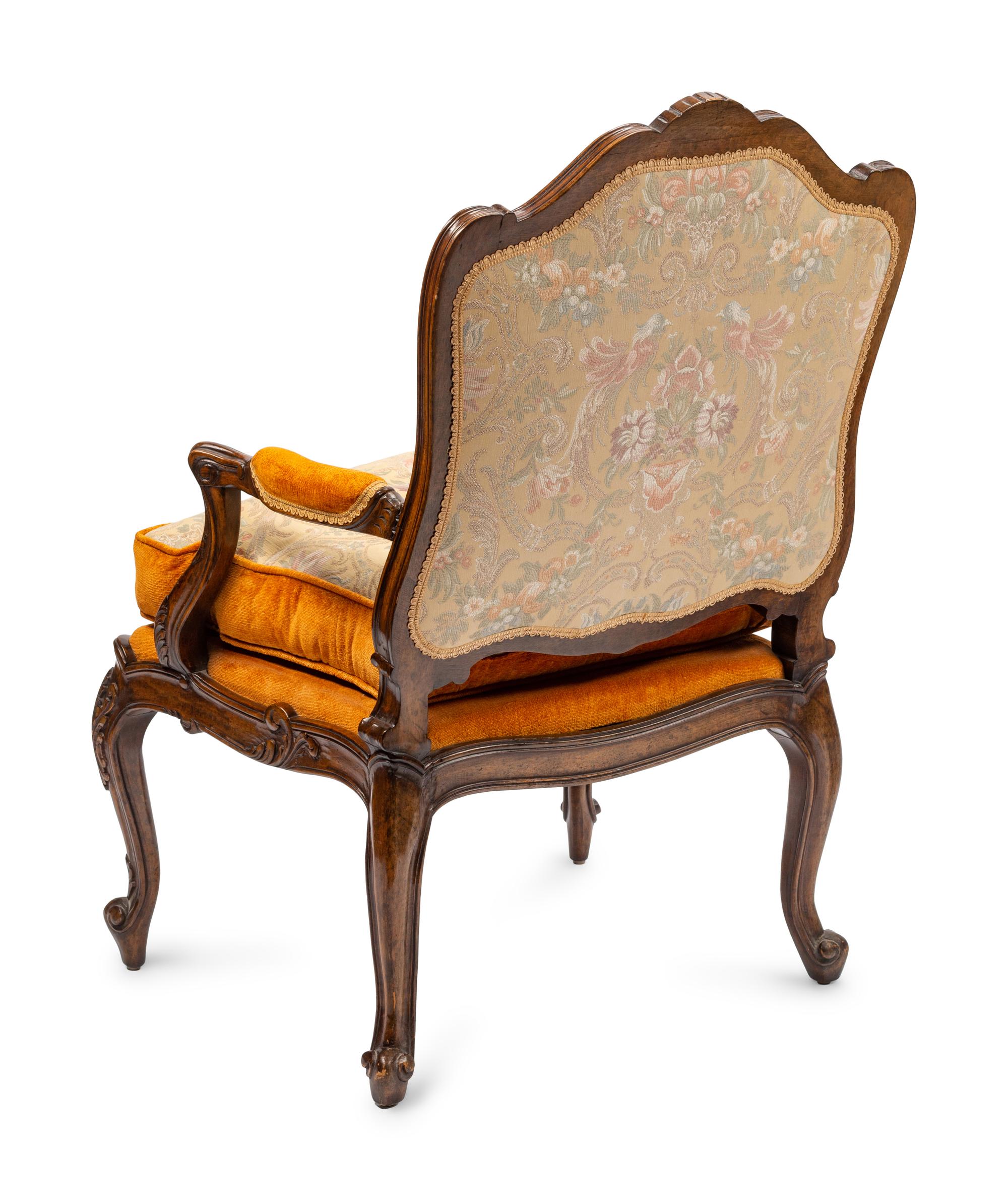 A Pair of Louis XV Style Walnut Fauteuils