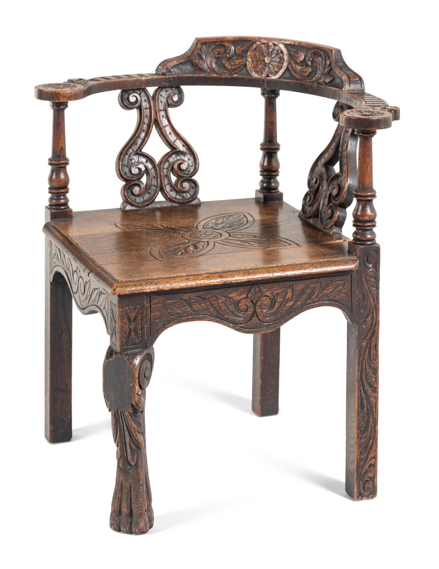 A William and Mary Carved Oak Corner Chair